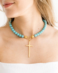 HANDCAST LONG GOLD CROSS ON MATTE TURQUOISE NECKLACE