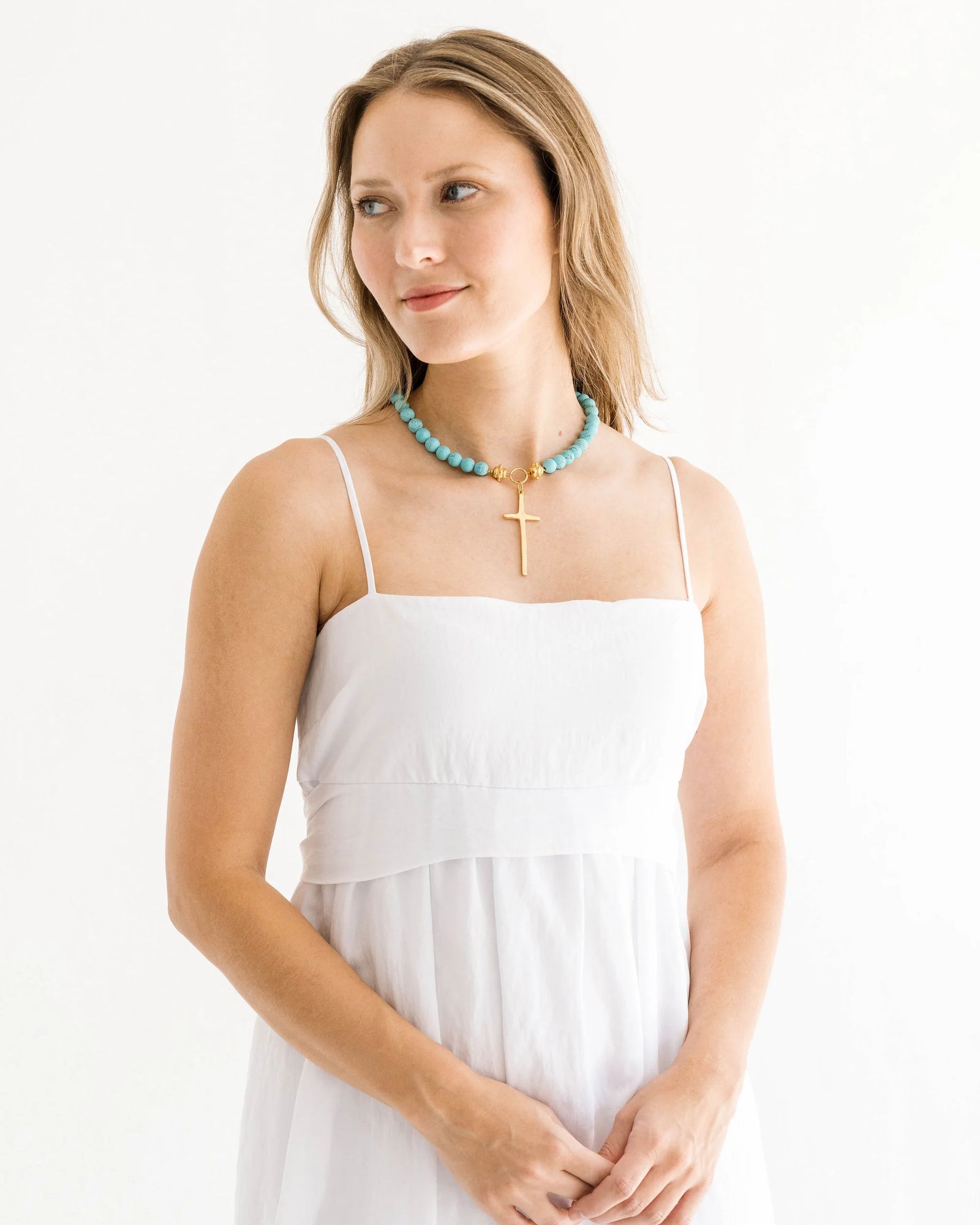 HANDCAST LONG GOLD CROSS ON MATTE TURQUOISE NECKLACE